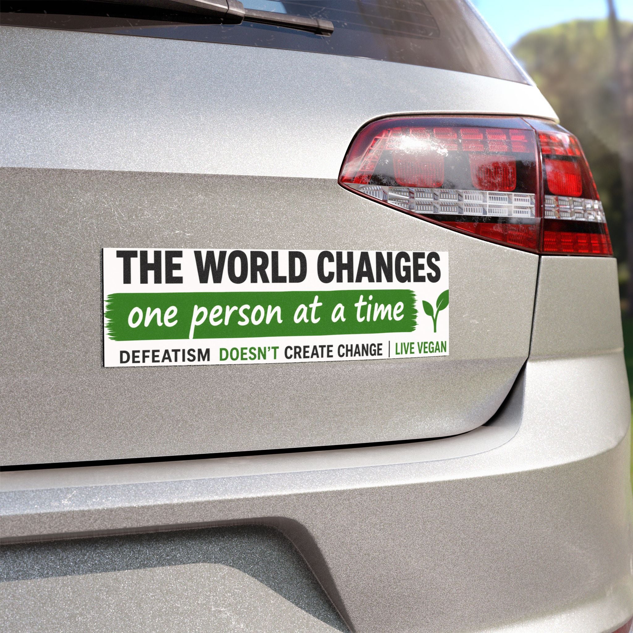 “The world changes one person at a time. Defeatism doesn't create change” Bumper Magnet