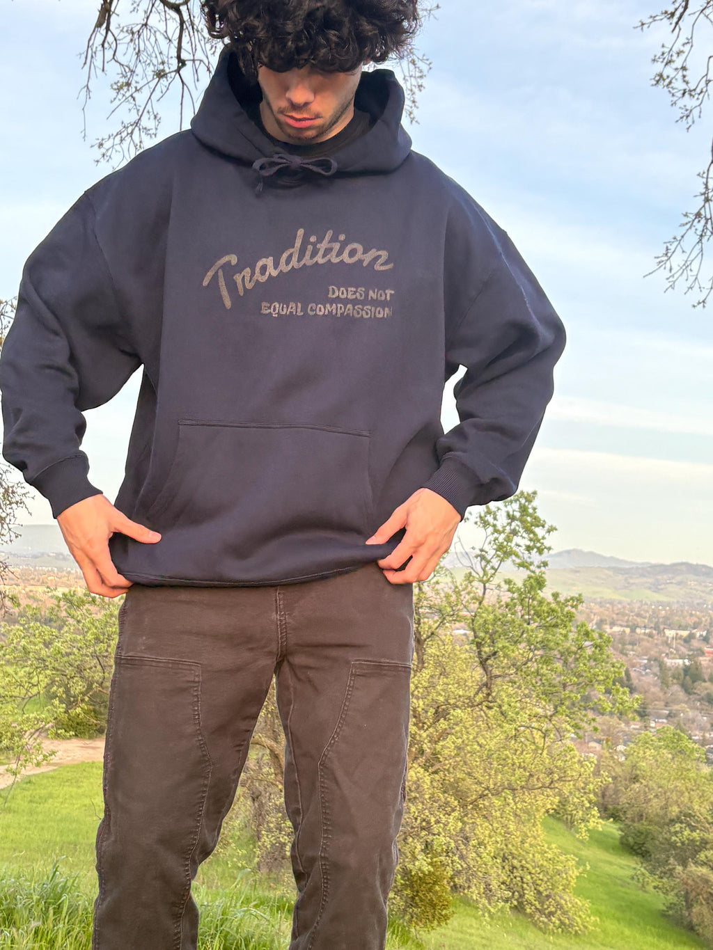 "Tradition Does Not Equal Compassion" 100% Organic Cotton Sweatshirt