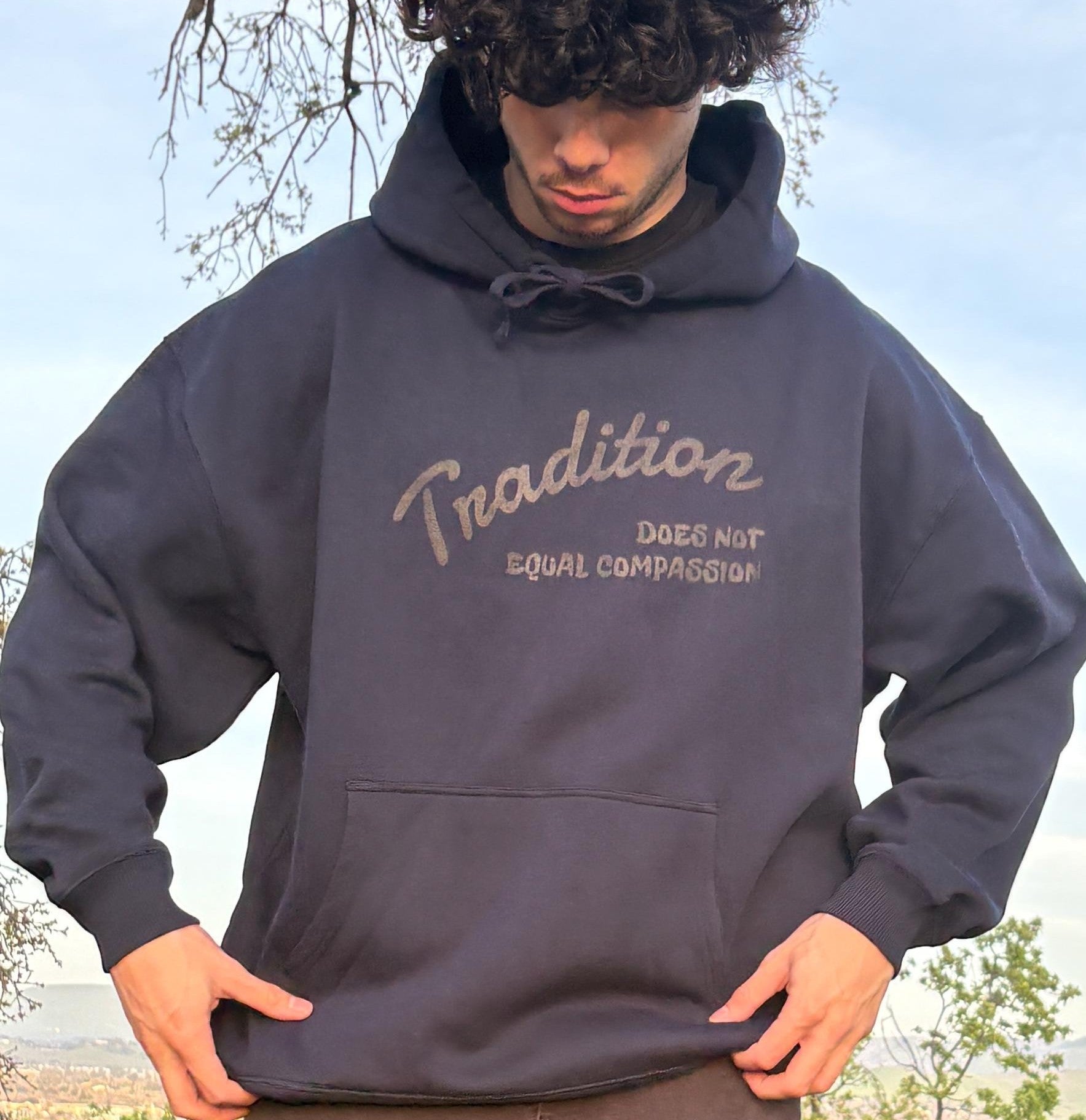 "Tradition Does Not Equal Compassion" 100% Organic Cotton Sweatshirt